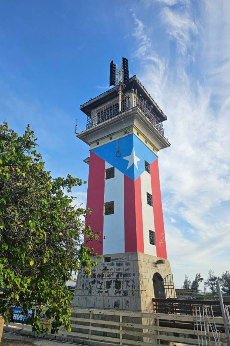 puerto rico flag on the side of the lighthouse in la guancha in ponce puerto rico